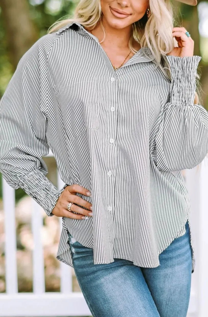 Mid-length shirt with striped lapel and oversized drawdown sleeves