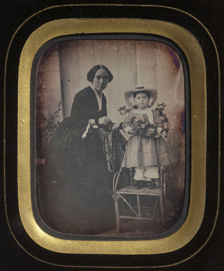 Child Standing on a Chair Holding Flowers, with Mother by  - Classic Art canvas print