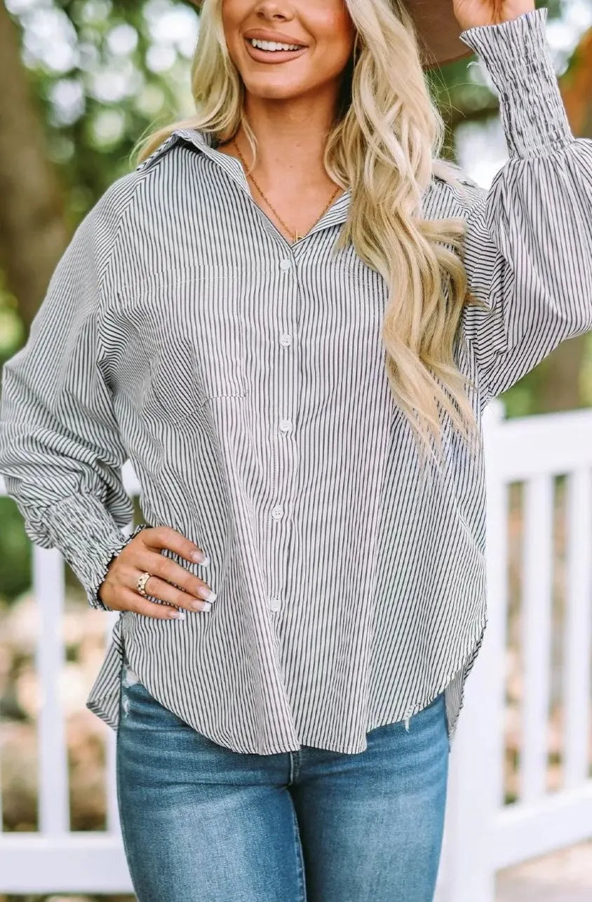 Mid-length shirt with striped lapel and oversized drawdown sleeves